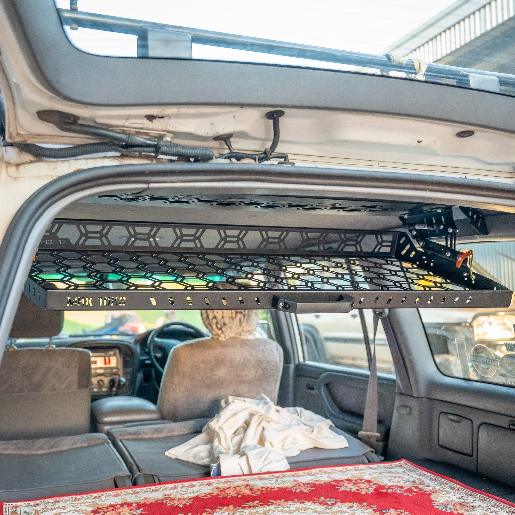 Drop Down Parcel Shelf to suit Toyota Land Cruiser 100 Series (Inward Facing Handles)