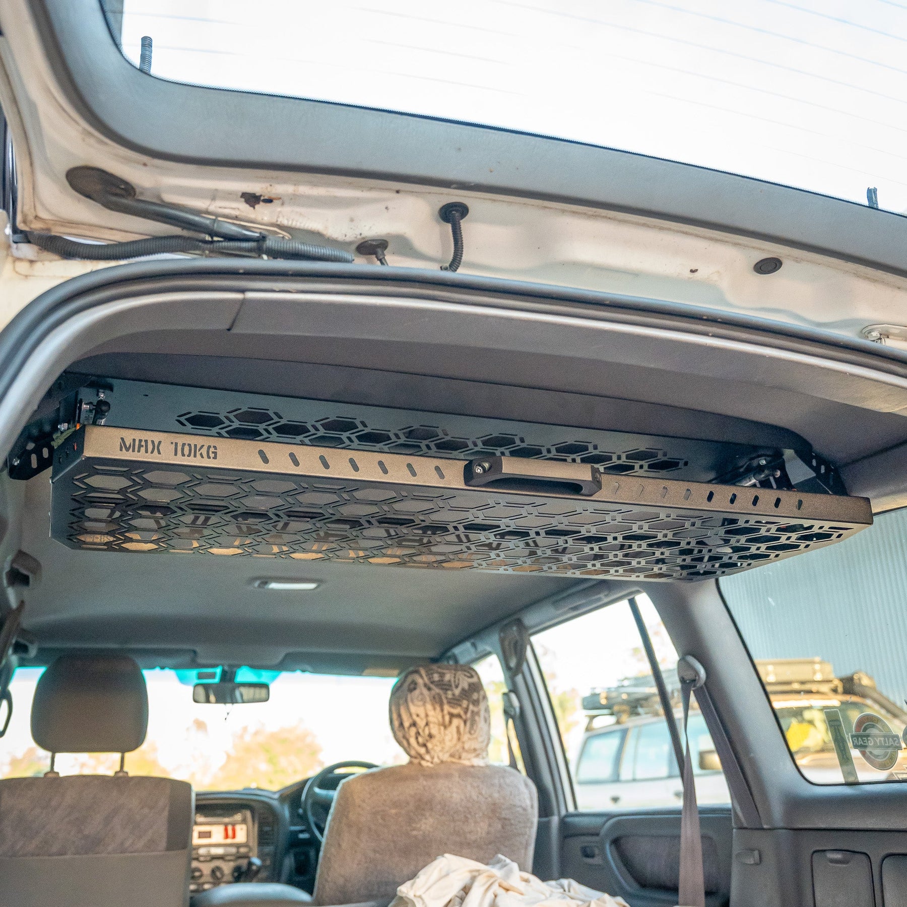 Drop Down Parcel Shelf to suit Toyota Land Cruiser 100 Series (Inward Facing Handles)